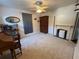 Bedroom with window, ceiling fan, and antique dresser at 110 N Volusia Ave, Pierson, FL 32180