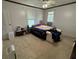 Spacious bedroom with window, ceiling fan, and ample floor space at 110 N Volusia Ave, Pierson, FL 32180