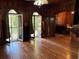 Living room with hardwood floors and French doors at 110 N Volusia Ave, Pierson, FL 32180