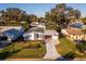 Mobile home with carport and landscaped yard at 1121 Paradise Dr, Lady Lake, FL 32159