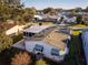 Property is shown in an aerial view, located in a neighborhood at 1121 Paradise Dr, Lady Lake, FL 32159