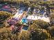 Resort-style community with pool, clubhouse, and tennis courts at 1121 Paradise Dr, Lady Lake, FL 32159