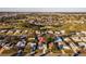 Aerial view of the home and surrounding neighborhood at 1121 Paradise Dr, Lady Lake, FL 32159