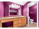 Main bathroom with wood vanity and tiled floor at 1121 Paradise Dr, Lady Lake, FL 32159