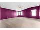 Bright bedroom with neutral carpet and bay window at 1121 Paradise Dr, Lady Lake, FL 32159