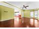 Spacious living room featuring hardwood floors and ample natural light at 1121 Paradise Dr, Lady Lake, FL 32159