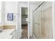 Clean bathroom with shower and vanity at 12 Hilly Way, Fruitland Park, FL 34731