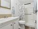 Bathroom with shower, toilet, and vanity at 12 Hilly Way, Fruitland Park, FL 34731