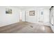 Primary bedroom with ensuite bathroom access and large window at 12 Hilly Way, Fruitland Park, FL 34731