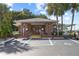Brick community building with parking and access ramp at 12 Hilly Way, Fruitland Park, FL 34731