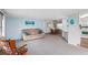 Open living room and dining area with light walls and carpeted floor at 12 Hilly Way, Fruitland Park, FL 34731