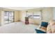 Spacious living room with ample natural light and comfy seating at 12 Hilly Way, Fruitland Park, FL 34731
