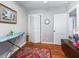 Well-lit spare bedroom with hardwood floors and a closet at 1200 S 7Th St, Leesburg, FL 34748