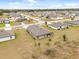 Aerial view of a residential neighborhood with single-Gathering homes at 12066 Callicarpa Ln, Leesburg, FL 34788