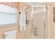 Bathroom featuring a shower stall and toilet at 1228 Zapata Pl, The Villages, FL 32159
