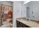 Simple bathroom with single vanity and shower/tub combo at 15828 Starlite St, Clermont, FL 34714