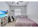 Cozy bedroom with a full-size bed and a TV at 15828 Starlite St, Clermont, FL 34714