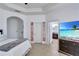 Large bedroom with ensuite bathroom and walk-in closet at 15828 Starlite St, Clermont, FL 34714