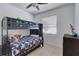 bedroom with a bunk bed and plenty of storage at 15828 Starlite St, Clermont, FL 34714