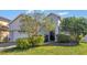 Beautiful home exterior with lush landscaping at 15828 Starlite St, Clermont, FL 34714