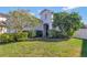 House exterior showcasing a front entrance and landscaping at 15828 Starlite St, Clermont, FL 34714