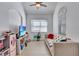 Bright Gathering room features a comfy couch and large TV at 15828 Starlite St, Clermont, FL 34714