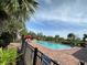 Community swimming pool with surrounding patio and seating at 15828 Starlite St, Clermont, FL 34714