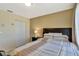 Comfortable bedroom with a full-size bed and ample closet space at 15836 Starlite St, Clermont, FL 34714
