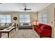 Relaxing living room with sofas, a coffee table and neutral color scheme at 15836 Starlite St, Clermont, FL 34714