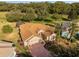 Aerial view of single-Gathering home with a large backyard at 17112 Se 71St Lewisfield Ter, The Villages, FL 32162