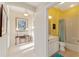 Small bathroom with tub shower combo and single vanity at 17112 Se 71St Lewisfield Ter, The Villages, FL 32162