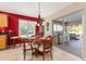 Charming breakfast nook boasts a round table and access to the patio at 17112 Se 71St Lewisfield Ter, The Villages, FL 32162