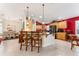 Modern kitchen with granite countertops and wood cabinets at 17112 Se 71St Lewisfield Ter, The Villages, FL 32162