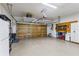 Spacious garage with shelving and ample storage space at 17350 Se 116Th Court Rd, Summerfield, FL 34491