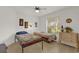 Small bedroom with two twin beds and a dresser at 17716 Se 85Th Ellerbe Ave, The Villages, FL 32162