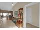 Bright entryway with tile flooring and coat rack at 17716 Se 85Th Ellerbe Ave, The Villages, FL 32162