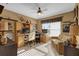 Home office with built-in desk and seating area at 17716 Se 85Th Ellerbe Ave, The Villages, FL 32162