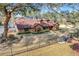 Beautiful lakefront home with lush landscaping at 18033 Rose St, Groveland, FL 34736