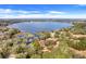 Large lakefront lot with house and lush landscaping at 18033 Rose St, Groveland, FL 34736
