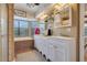 Double vanity bathroom with a large garden tub and shower at 18033 Rose St, Groveland, FL 34736