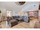 Spacious living room with L-shaped sectional sofa at 18033 Rose St, Groveland, FL 34736