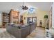 Cozy living room with fireplace and vaulted ceiling at 18033 Rose St, Groveland, FL 34736
