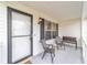 Cozy front porch with seating for relaxing at 1904 De Hoyos Pl, The Villages, FL 32159