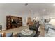 Spacious living room seamlessly blends into the dining area and kitchen, perfect for entertaining at 1904 De Hoyos Pl, The Villages, FL 32159