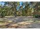 Wooded lot offering ample space and privacy at 19315 Dorr Rd, Altoona, FL 32702