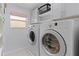 Convenient laundry room with washer and dryer at 2371 Longbow Trl, The Villages, FL 32162