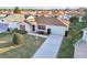 Attractive single-Gathering home with a two-car garage and well-manicured lawn at 2486 Five Forks Trl, The Villages, FL 32162