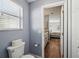 Guest bathroom with toilet and access to the bedroom at 2486 Five Forks Trl, The Villages, FL 32162