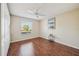 Spacious bedroom with hardwood floors and ample closet space at 2486 Five Forks Trl, The Villages, FL 32162