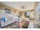 Spacious sunroom with ample natural light and seating area at 2486 Five Forks Trl, The Villages, FL 32162